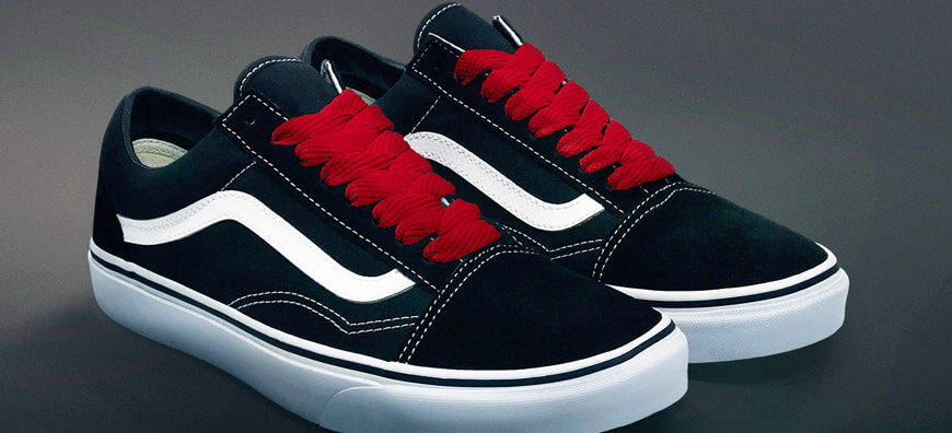 black vans with red laces